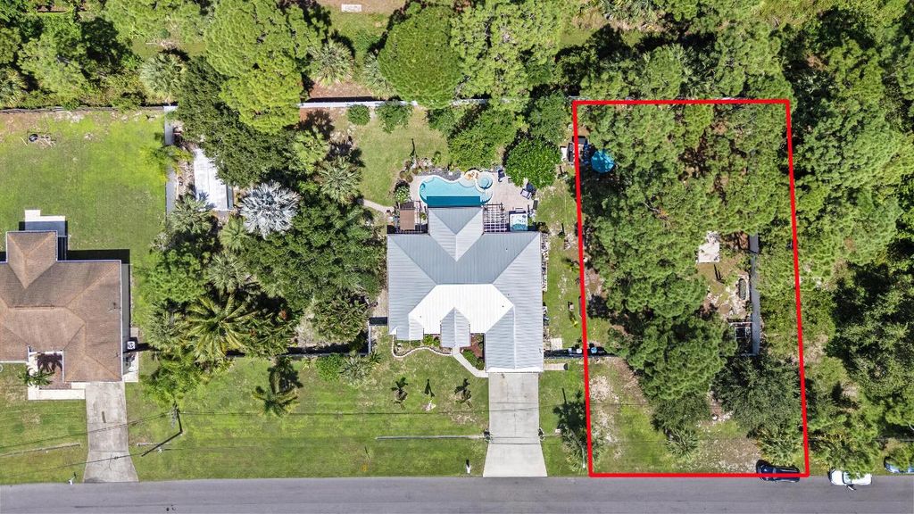 Photo of 1067 SW Placetas Avenue, Port Saint Lucie, FL 34953 (MLS # R11126426)