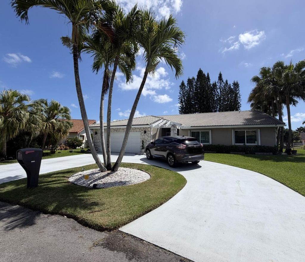 Photo of 7626 NW 87th Avenue, Tamarac, FL 33321 (MLS # B26011256)