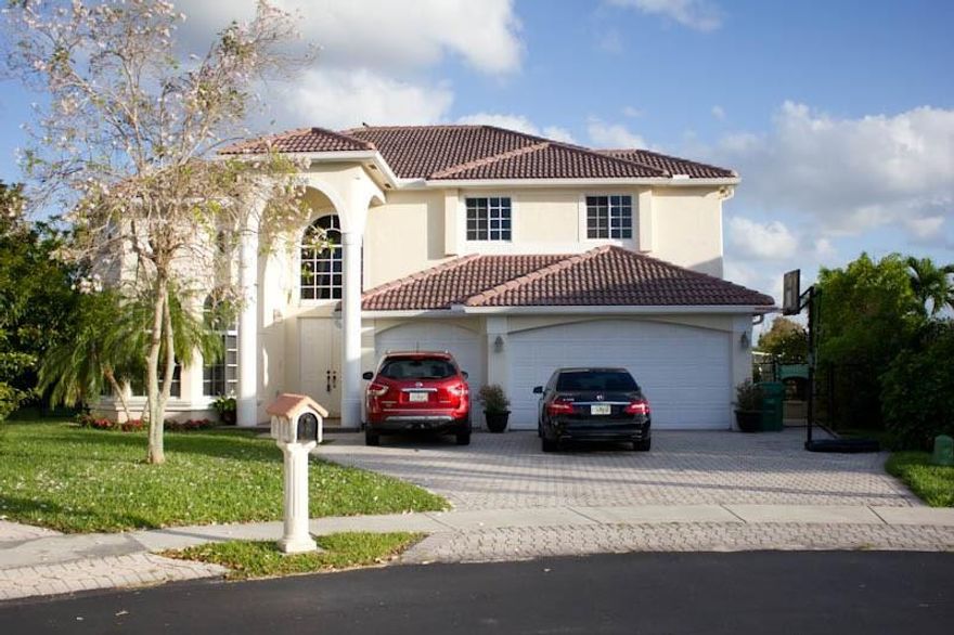 Gorgeous 4/3 home with pool and 3 car garage located in the gated community of Eagle Lakes. This home is a must see, with an open floor plan that features formal living and dining area, beautifully upgraded kitchen cabinets with granite countertops, tile throughout the first floor and bamboo flooring throughout the second level. This home has everything to offer, from it's stunning vaulted ceilings to it's large master suite with balcony overlooking the pool.