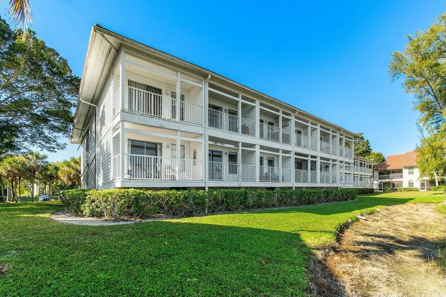 Enjoy breathtaking panoramic lake views from this charming 1-bedroom, 1-bathroom condo in the highly desirable Cypress Point community of PGA National. This first floor unit offers ultimate convenience and tranquility, featuring a covered balcony perfect for relaxing and enjoying the serene waterfront setting. Inside, you'll find vinyl flooring in the main living areas, Quartz countertops in both the kitchen and bathroom, and a spacious 4-person snack bar for casual dining. A new central air system was installed last year for added comfort. Cypress Point residents enjoy access to a community pool and on-site laundry facilities. Plus, two pets up to 25 lbs each are welcome! Experience the resort-style lifestyle of PGA National, home to world-class golf, dining, and