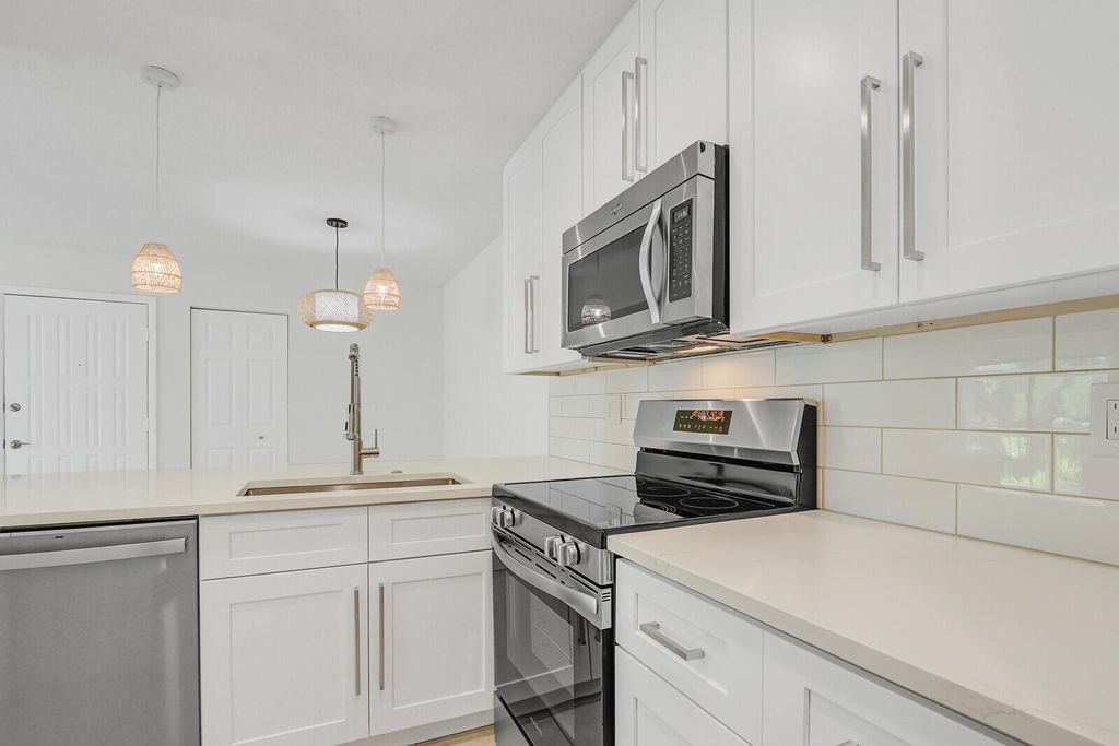 Photo of 3402 Gardens East Drive #16b, Palm Beach Gardens, FL 33410 (MLS # R11120730)