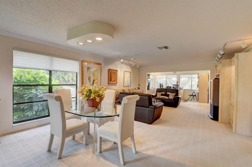 Looks Like You Hit The Jackpot!!! Beautiful 2nd Floor Corner Westgate 2 Bedroom/ 2 Bathroom Condo Overlooking the Prestigious South Course at Hunters Run Country Club.  Featuring Convenient Semi Private Lift to Your Pied a Tierre. Large  Eat In Kitchen Boasts White Cabinetry. Light & Bright. Enjoy the Expansive Golf Vistas From the Impact Glass Enclosed Office/Den. Own Your Own Golf Cart, Electric and Cart Pad Already Installed Waiting For you !!Hunters Run Country Club, Where You Come for The Golf & Tennis and... Stay For The Friends