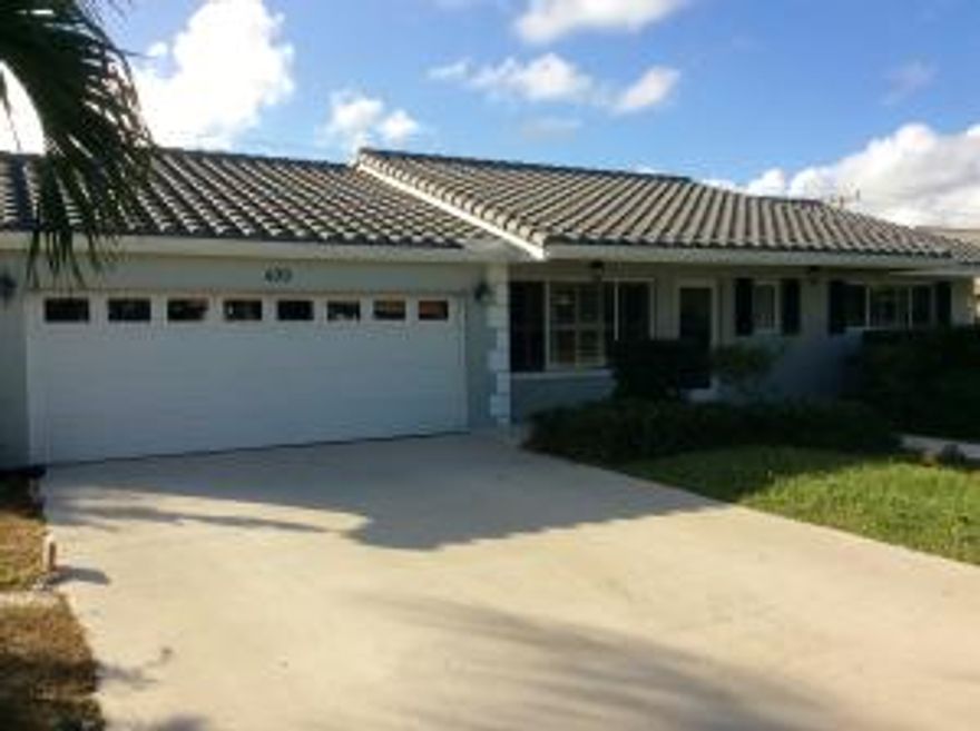 Beautifully renovated Royal Oak Hills home featuring a brand new concrete roof, hurricane impact windows and tile floors. The kitchen has custom cabinets, granite countertops, stainless appliances and marble backsplash. The Florida room overlooks a landscaped pool area. Stone tiles surround the pool area. The home has a large 2 car garage and inside laundry room. The electrical has just been updated. 
 There is a 3rd room that is ideal for an office or a huge walk-in pantry. It has been used as a bedroom in the past.