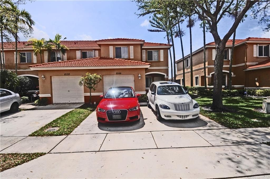 Photo of 6144 Reynolds St #6144, West Palm Beach, FL 33411 (MLS # F10322130)