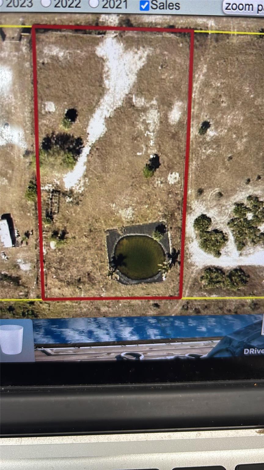 This 1.25-acre cleared lot at 16432 NW 252nd St in Okeechobee, FL, is Ready to build, offers a tranquil setting for your future home or getaway. The property is zoned AGRICULTURE and approved for both concrete and manufactured homes. It features a permitted culvert installed in 2023, is fenced, and has a water well, A pond/natural pool (comes with filter and pump), which adds to the property's charm. With no HOA fees, you have the freedom to develop as you wish. Conveniently located near Hwy-441, Hwy-98, and the FL Turnpike, it's just a short drive to Kissimmee Prairie Preserve State Park and Lake Okeechobee. The lot dimensions are approximately 165 x 300 feet. Annual taxes are estimated at $583.00