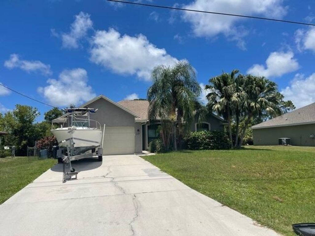 Photo of 449 SE Glenwood Drive Dr, Port St Lucie, FL 34984 (MLS # R10731456)