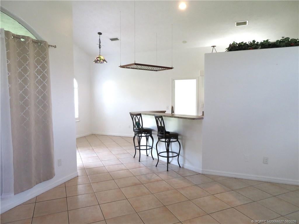 Photo of 1102 SW Coleman Avenue, Port Saint Lucie, FL 34953 (MLS # M20056527)
