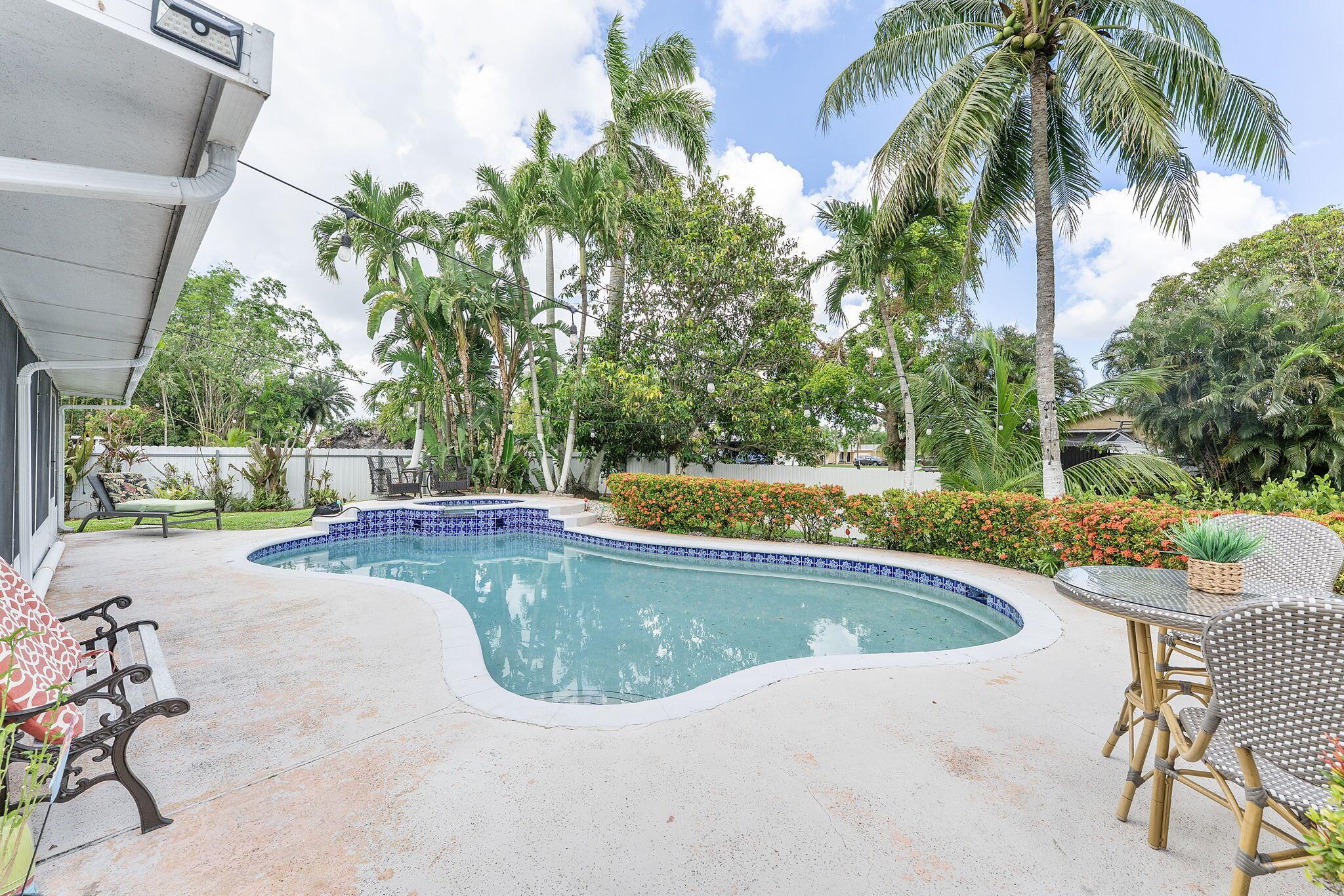 WATERFRONT - POOL - CORNER LOT - IN-LAW SUITE - LAKE DECK- NO HOAThis UNIQUE PROPERTY has it all and offers the perfect blend of comfort, versatility, and location, ideal as an AIRBNB INVESTMENT or a FAMILY DREAM HOME.Located in the heart of DESIRED PEMBROKE PINES, in a QUIET, FAMILY-FRIENDLY NEIGHBORHOOD, just minutes from main avenues, the FLORIDA TURNPIKE, top-rated SCHOOLS, STORES, RESTAURANTS, and more.This 4 BEDROOM / 3 BATHROOM home sits on a spacious CORNER LOT with MATURE LANDSCAPING and features an OPEN FLOOR PLAN, TILE FLOORING THROUGHOUT, a MODERN KITCHEN WITH STAINLESS STEEL APPLIANCES, and UPDATED BATHROOMS.Enjoy LAKE VIEWS FROM YOUR ENCLOSED PATIO, unwind on your PRIVATE LAKE DECK, and host guests by the SPARKLING POOL and CUSTOM OUTDOOR BBQ COUNTER.