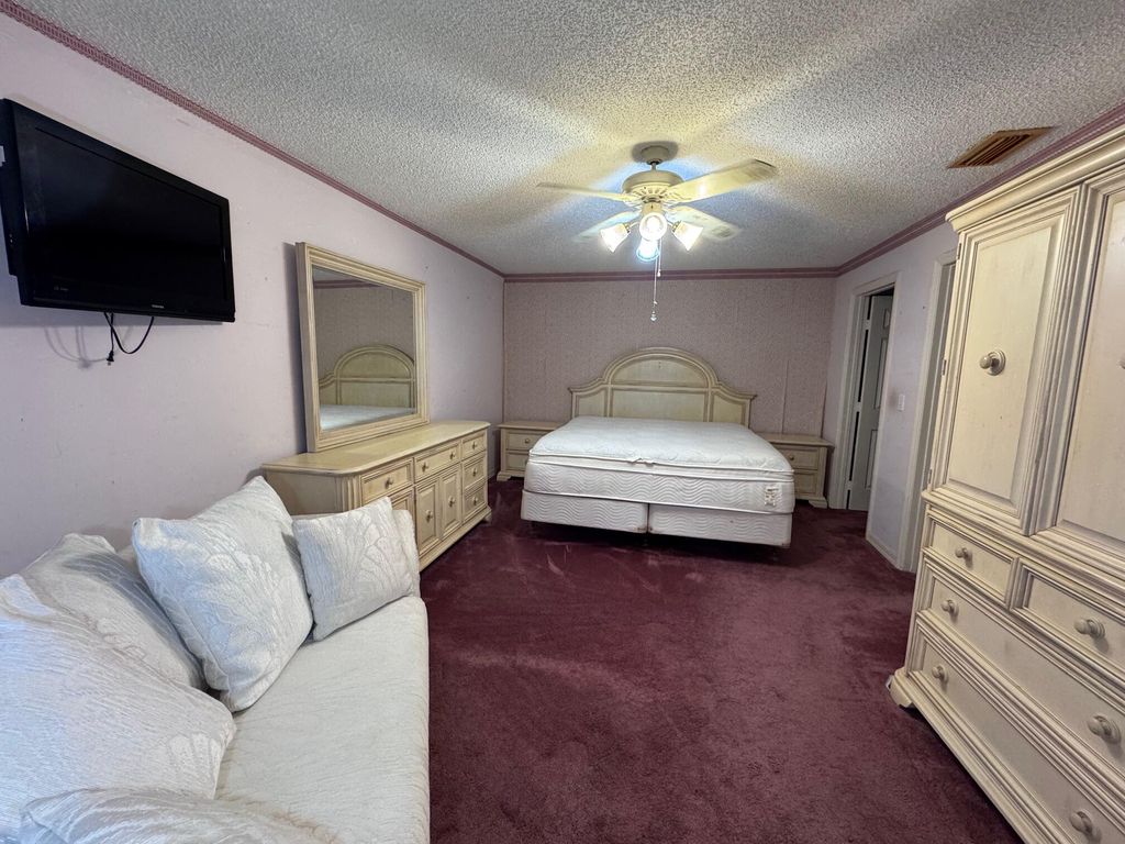 Photo of 1303 Peppertree Trail #C, Fort Pierce, FL 34950 (MLS # R11159027)