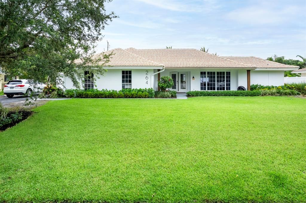 Photo of 264 River Drive, Tequesta, FL 33469 (MLS # R10744384)