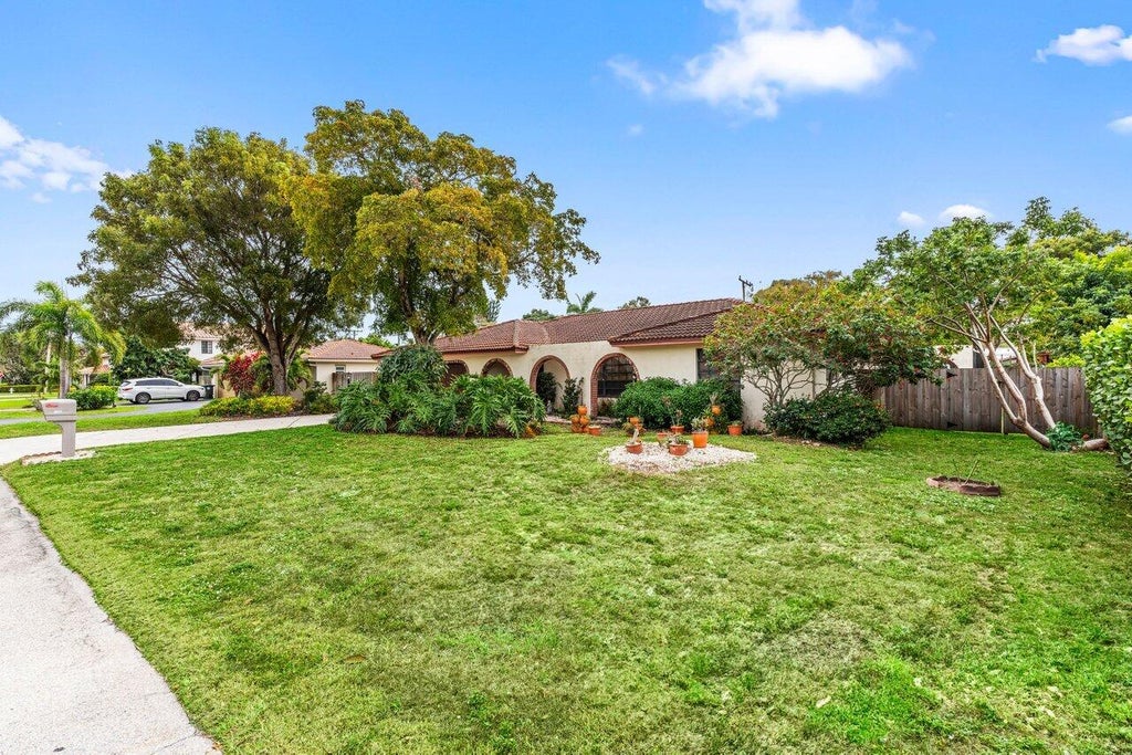 Photo of 1120 SW 16th Street, Boca Raton, FL 33486 (MLS # R11064971)