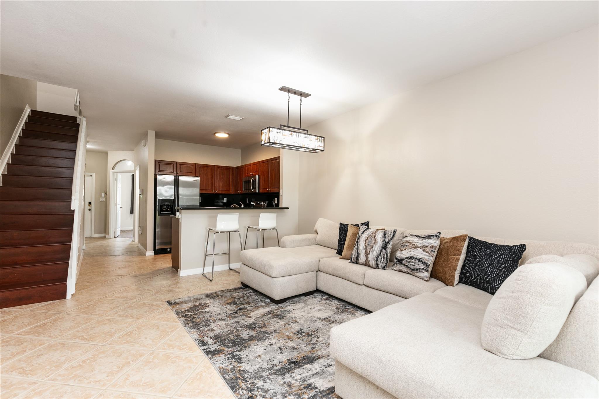 Rare Opportunity in Woodland Villas! This stunning renovated townhome offers 3 bedrooms and 3 full bathrooms, featuring granite countertops, stainless steel appliances, and a thoughtful layout designed for comfort and convenience. The main floor includes 1 bedroom and a full bathroom, while the upstairs boasts 2 spacious bedrooms with ensuite bathrooms and walk-in closets. Tile flooring on 1st floor and laminate flooring extends from the stairs to the second floor, adding a modern touch. Washer and dryer conveniently located upstairs. Small dogs/cats allowed, and 4 parking spaces. Relax and unwind with picturesque views of the Colony West Championship golf course right from your backyard. ***GOOD CREDIT? LANDLORD MAY CONSIDER 1ST MONTH AND SECURITY DEPOSIT ONLY FOR MOVE IN ***
