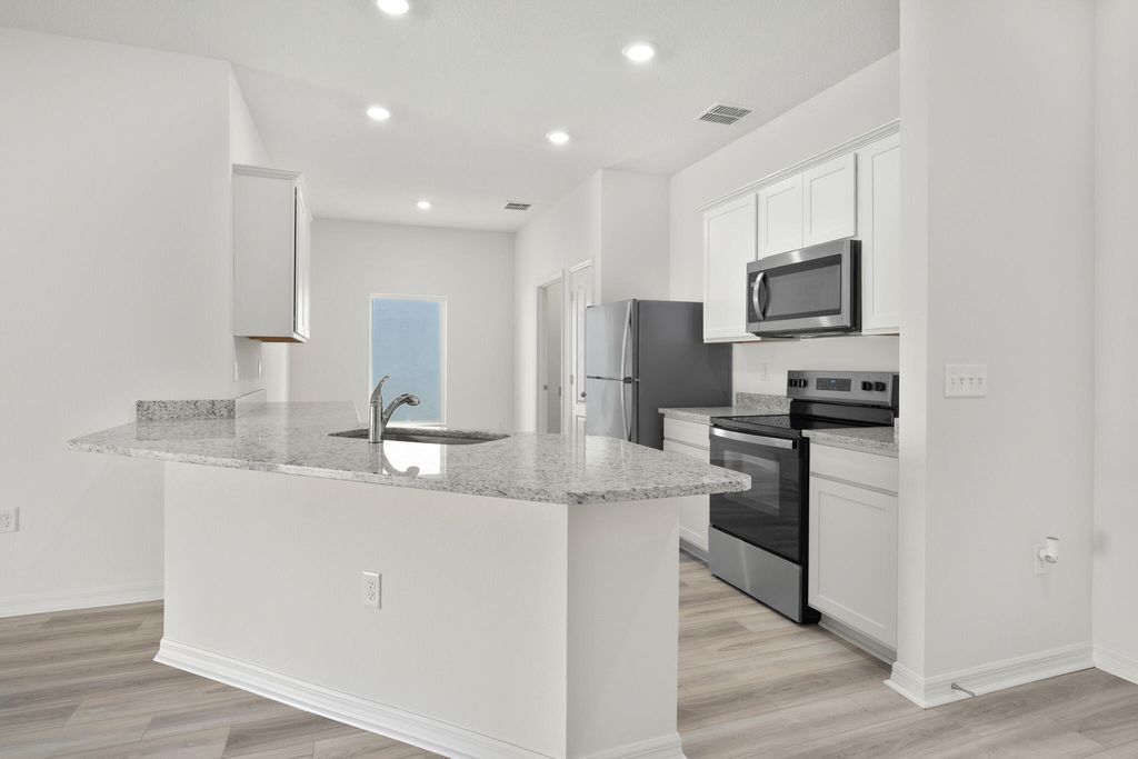 Photo of 5204 Palm Drive, Fort Pierce, FL 34982 (MLS # B26013944)