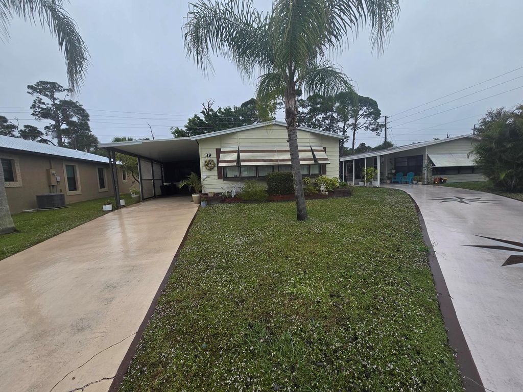 Photo of 39 Flores Del Norte, Fort Pierce, FL 34951 (MLS # R11078175)