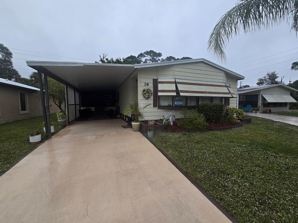 Photo of 39 Flores Del Norte, Fort Pierce, FL 34951 (MLS # R11078175)