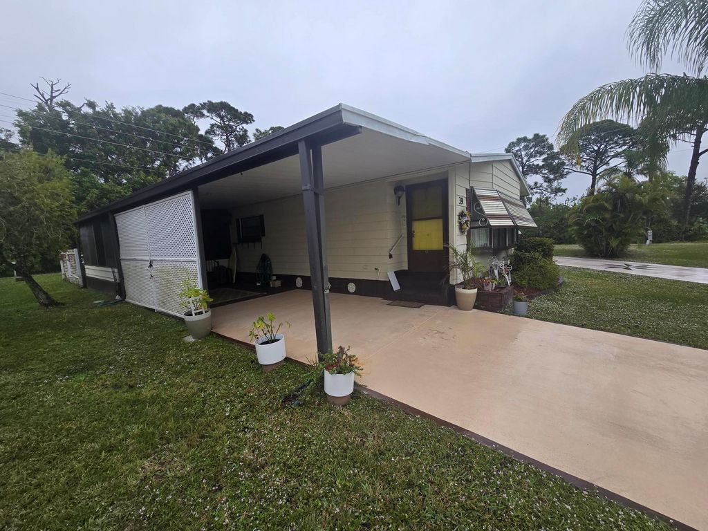 Photo of 39 Flores Del Norte, Fort Pierce, FL 34951 (MLS # R11078175)