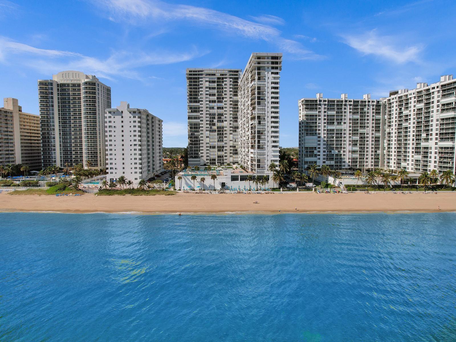 Step into paradise with this 3BR/2.5BA corner condo offering 2,400 sq. ft. of living space and endless potential! Floor-to-ceiling windows and a wraparound balcony showcase sweeping ocean and Intracoastal views—perfect for sunrises and sunsets. A semi-private elevator (only 2 units per floor) adds exclusivity, while inside you’ll find custom built-ins, a marble master bath, high-end fixtures, and in-unit laundry. The 3rd bedroom doubles as an office, with space for a 4th bedroom/den. Resort-style amenities include a heated pool, gym, and meeting rooms. Ideally located near Lauderdale-By-The-Sea, Las Olas, and the airport. With multi-million-dollar renovations underway, this is your chance to secure an oceanfront deal and long-term value in one of the area’s most desirable communities!