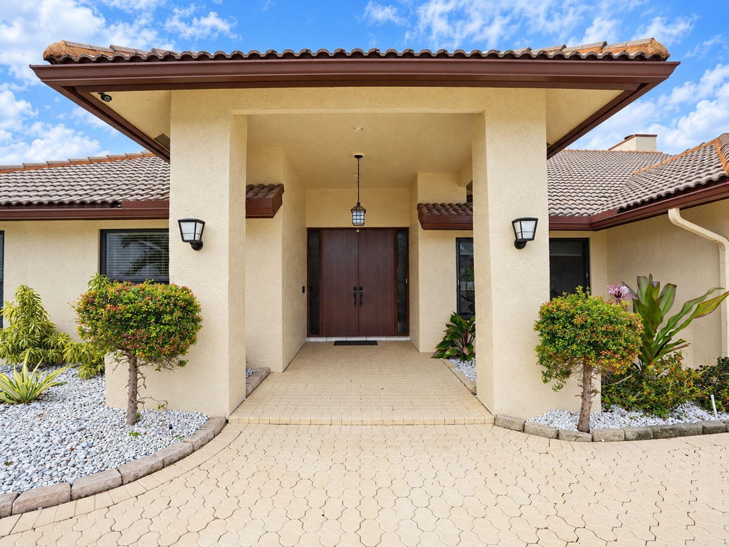 Photo of 7719 NW 86TH Way, Tamarac, FL 33321 (MLS # B26088696)