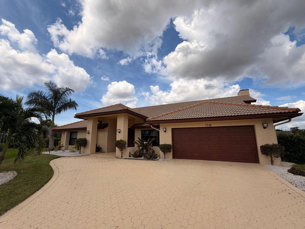 Photo of 7719 NW 86TH Way, Tamarac, FL 33321 (MLS # B26088696)