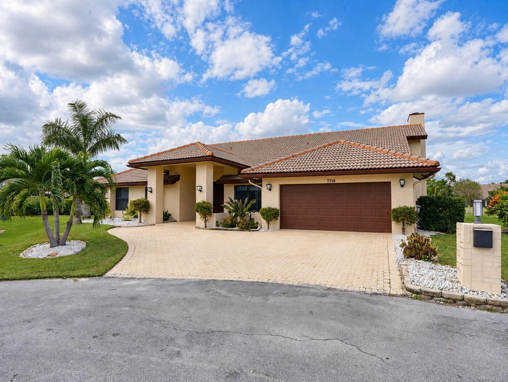 Photo of 7719 NW 86TH Way, Tamarac, FL 33321 (MLS # B26088696)