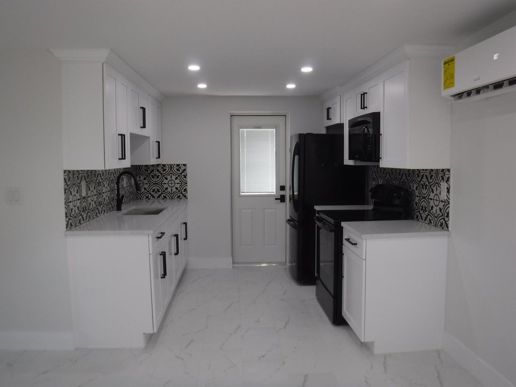 Photo of 1280 Sunset Road, West Palm Beach, FL 33406 (MLS # R11056859)