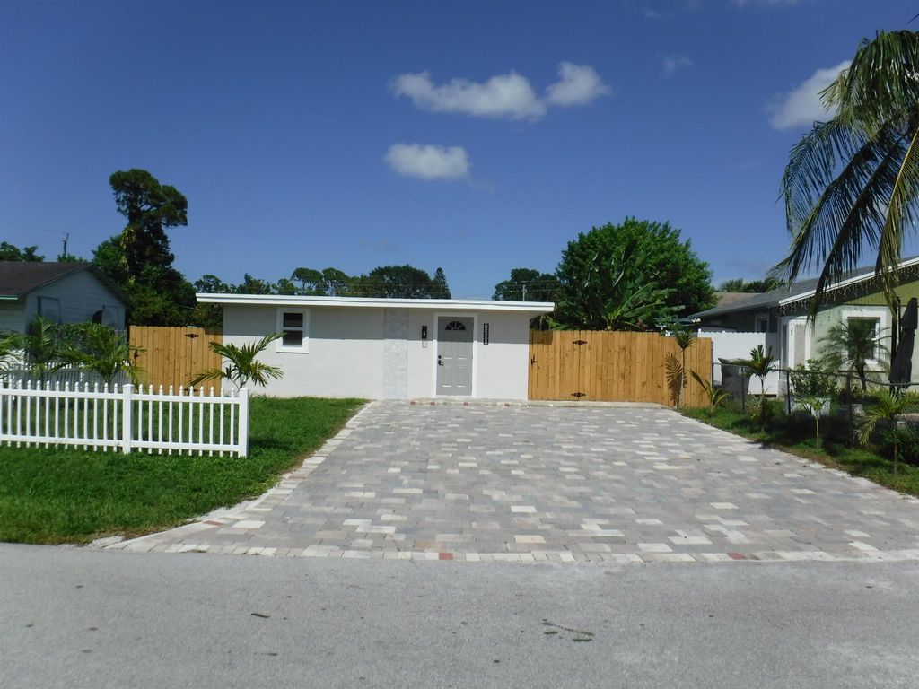 Photo of 1280 Sunset Road, West Palm Beach, FL 33406 (MLS # R11056859)