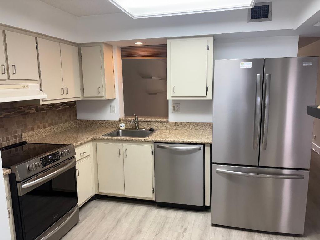 Photo of 357 N Rock Island Road, Margate, FL 33063 (MLS # B26015361)