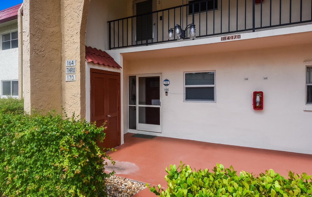 Photo of 166 Lake Carol Drive, West Palm Beach, FL 33411 (MLS # B26055389)