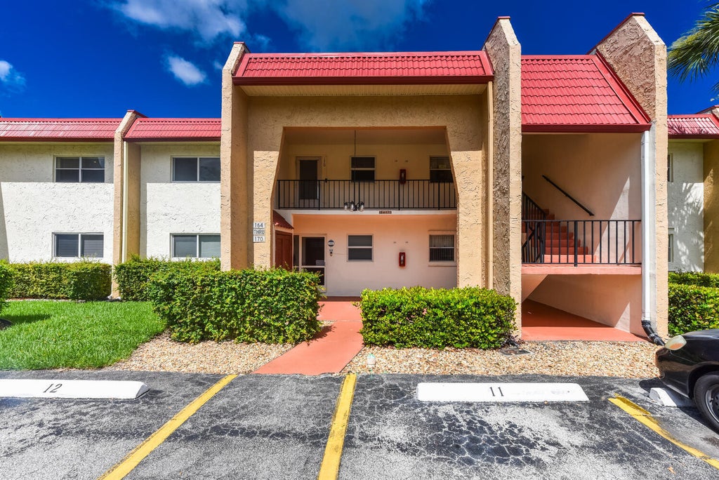 Photo of 166 Lake Carol Drive, West Palm Beach, FL 33411 (MLS # B26055389)