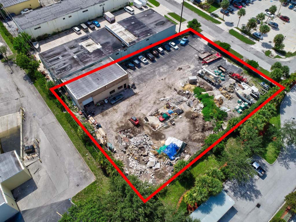 Photo of 1405 N Killian Drive, Lake Park, FL 33403 (MLS # B26059115)
