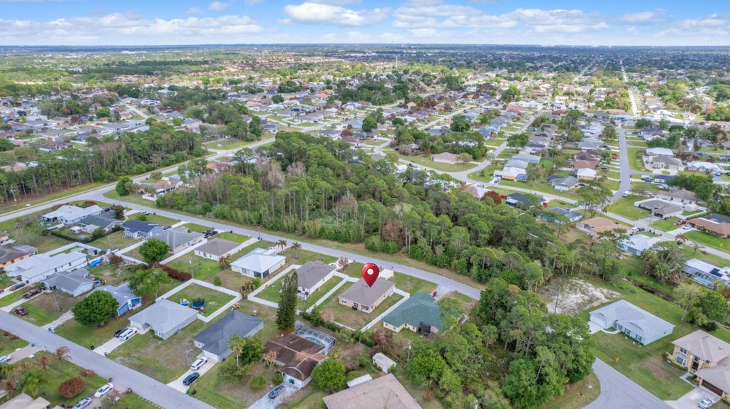 Photo of 1858 SW Lennox Street, Port Saint Lucie, FL 34953 (MLS # B26007060)