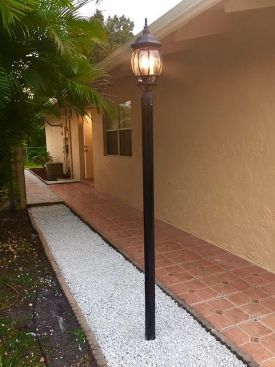 Charming waterfront two bedroom two bathroom villa in a desirable area in North Lauderdale. It has been remodeled. 18 feet high ceilings, open floor plan, tile floors throughout, plenty of closets, the nice-sized fenced back yard is perfect for relaxing or any celebration; Peaceful Stranahan River Views adds to your private home experience. Separate Laundry room with washer and dryer. Freshly painted exterior and interior, designed landscape, 2 parking spaces. Quiet neighborhood, close to shopping, dining and transportation. THERE IS NO ASSOCIATION.