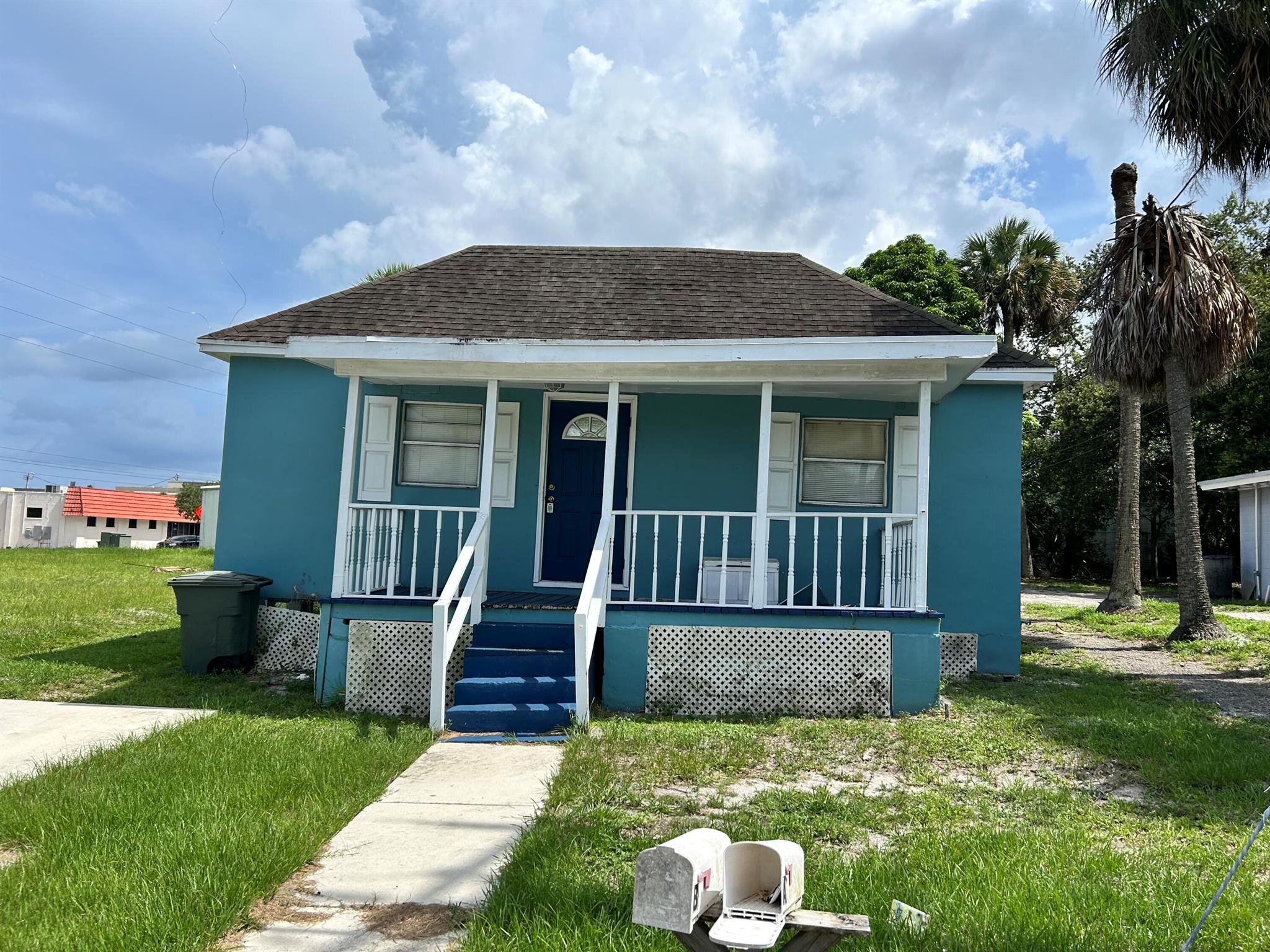Investor Special. 2 single family homes each with separate water and electric meters. Located near federal courthouse, beaches, and shopping. Front unit has violations and mold. Unit is vacant. Back unit is on a month to month lease.