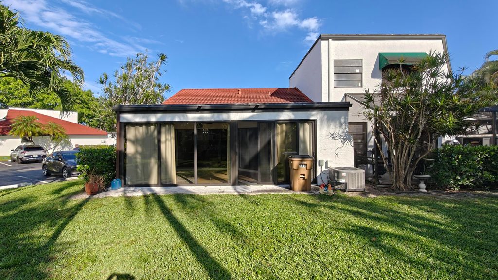 Photo of 385 NW 36th Avenue, Deerfield Beach, FL 33442 (MLS # B26007325)