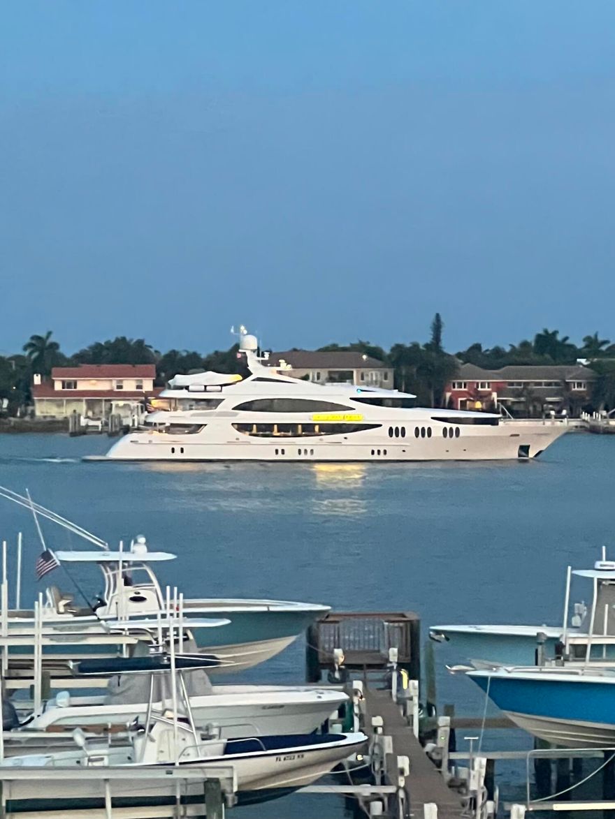 BOATER'S PARADISE!  JUST IMAGINE...WATERFRONT LIVING in this 2 Bedroom - 2&1/2 Bath Intracoastal condo with PANORAMIC water views, facing the DOCK with your own private BOAT SLIP for up to a 30 ft BOAT, and DIRECT OCEAN ACCESS with no fixed bridges.  Rare two-story, third-floor residence featuring impact windows, Brazilian cherry wood floors, an open terrace with sunrises, and water views from every room. Two upstairs waterfront ensuite bedrooms with generous closets. Boutique building with only 25 residences and low HOA fees. Minutes to Palm Beach, beaches, dining, shopping, I-95, and PBIA.