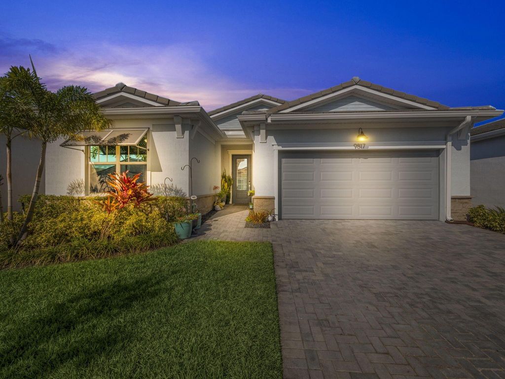 Photo of 9817 SW Isabelline Drive, Port Saint Lucie, FL 34987 (MLS # R11128576)