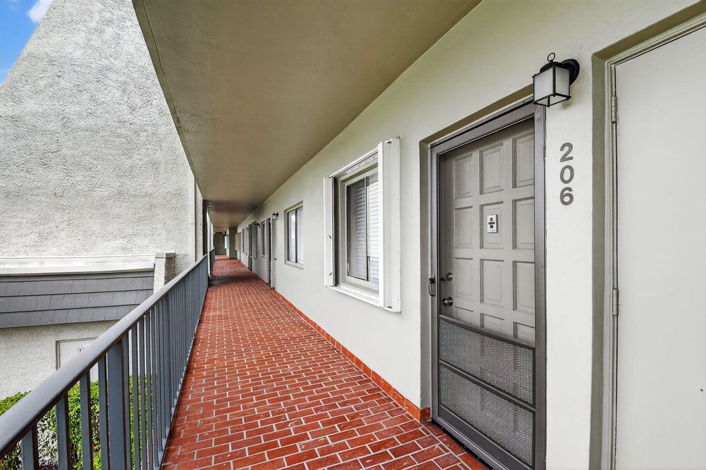 Photo of 4080 Tivoli Court E #206, Lake Worth, FL 33467 (MLS # B26002224)