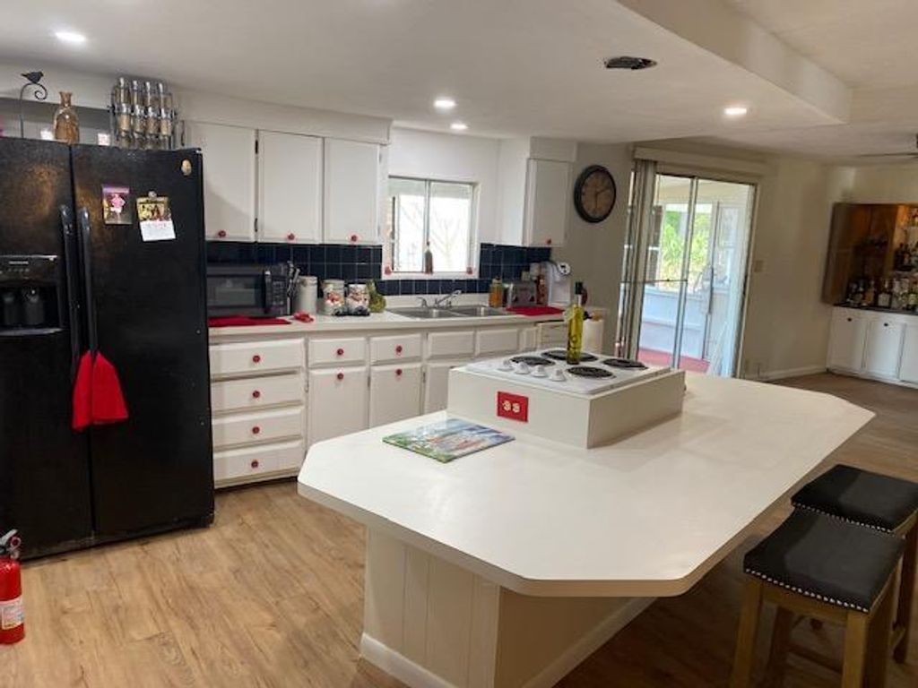 Photo of 4375 71 Place, Riviera Beach, FL 33404 (MLS # R10703649)