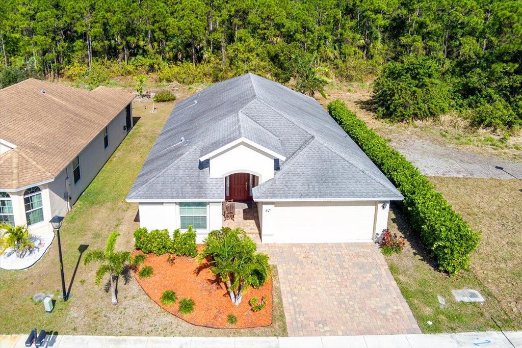 Photo of 9756 Palm Breezes Drive, Fort Pierce, FL 34945 (MLS # R11156567)
