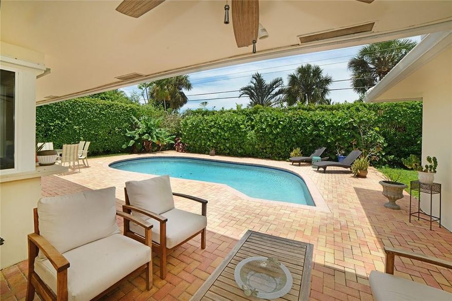 Best buy in Camino Gardens! Upgraded 3/2.5 with classic floor plan. New hardwood floors. Open concept living and dining room with French doors leading out to covered patio.  Gourmet kitchen includes granite counters, wood cabinets and new induction stove. Large master with a walk in closet and contemporary bathroom with access to the pool. Recently built out laundry/half bath! Impact glass windows, plantation shutters, fresh paint. This won't last! Call Jonathan for showings 5612717443