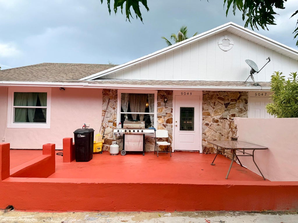 Photo of 5045 SE DRIFTWOOD Avenue, Stuart, FL 34997 (MLS # B26068981)