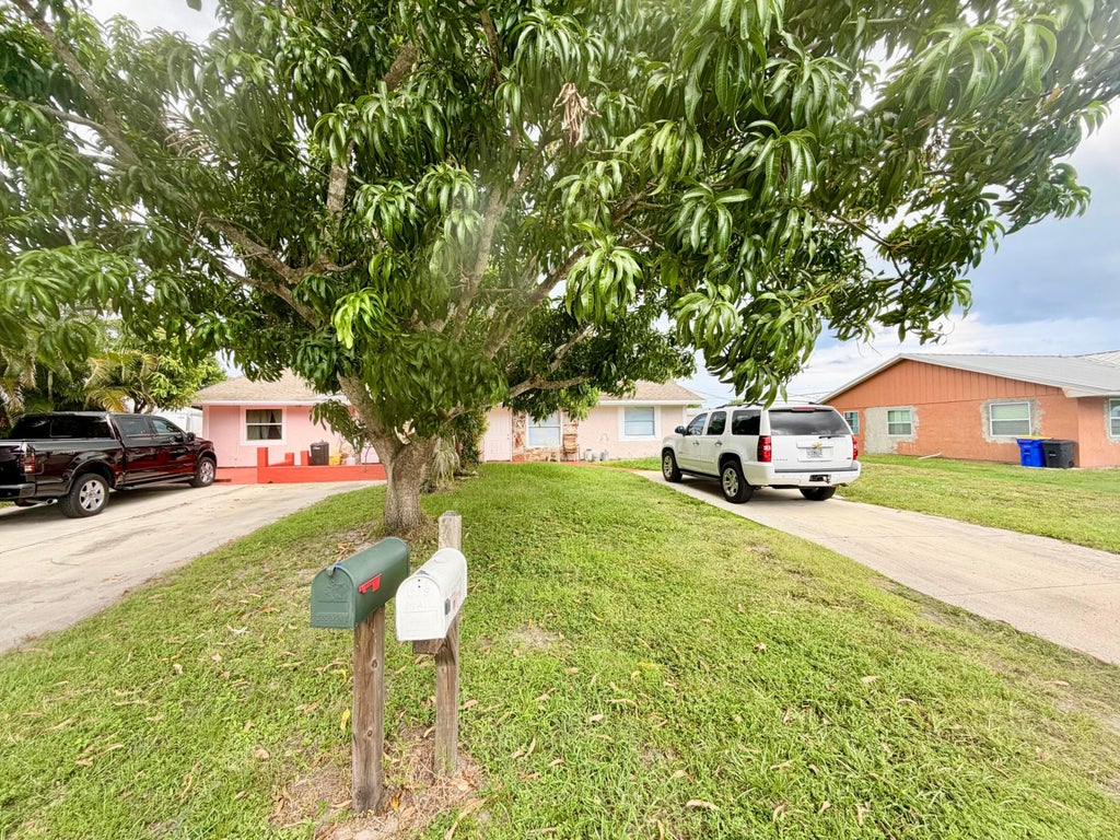 Photo of 5045 SE DRIFTWOOD Avenue, Stuart, FL 34997 (MLS # B26068981)