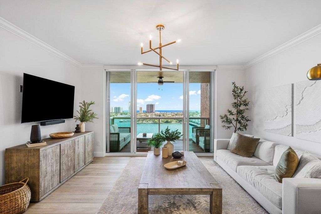 Photo of 2640 Lake Shore Drive #1410, Riviera Beach, FL 33404 (MLS # B26022289)