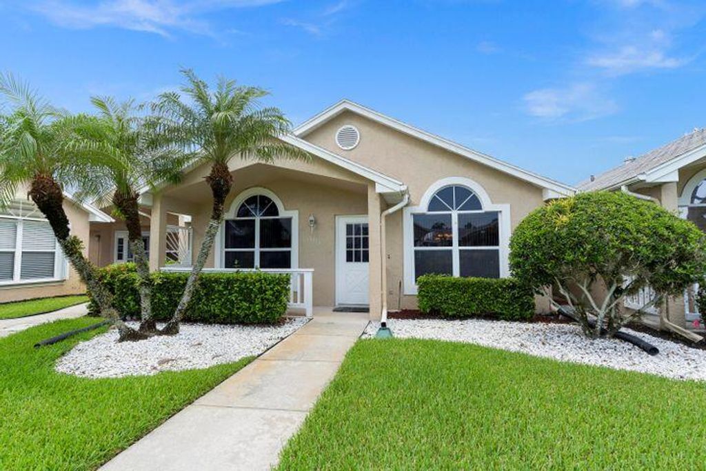 Photo of 1134 NW Lombardy Drive Dr, Saint Lucie West, FL 34986 (MLS # R10832701)