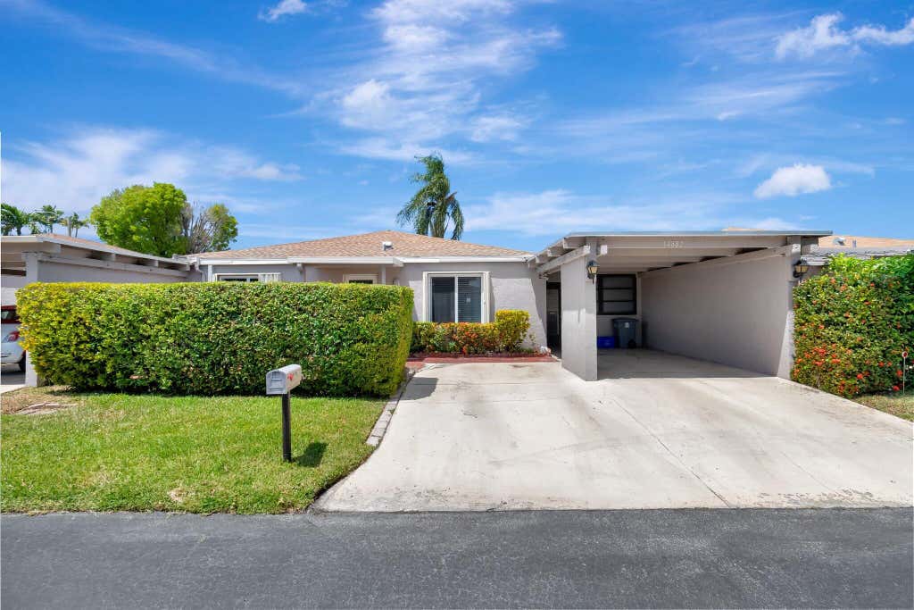 Photo of 14882 Wildflower Lane, Delray Beach, FL 33446 (MLS # B26044549)