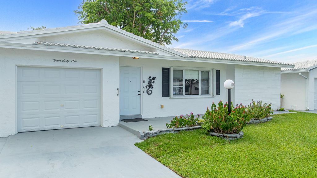 Photo of 1261 NW 90th Drive, Plantation, FL 33322 (MLS # B26033916)