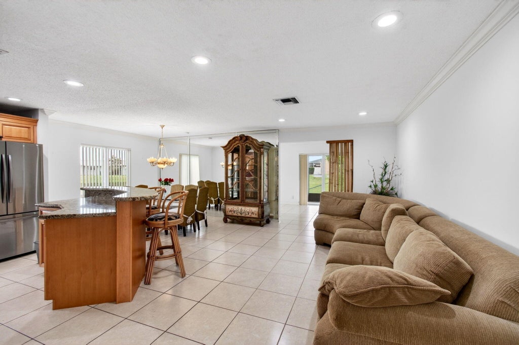 Photo of 6049 Dusenburg Road, Delray Beach, FL 33484 (MLS # B26074728)