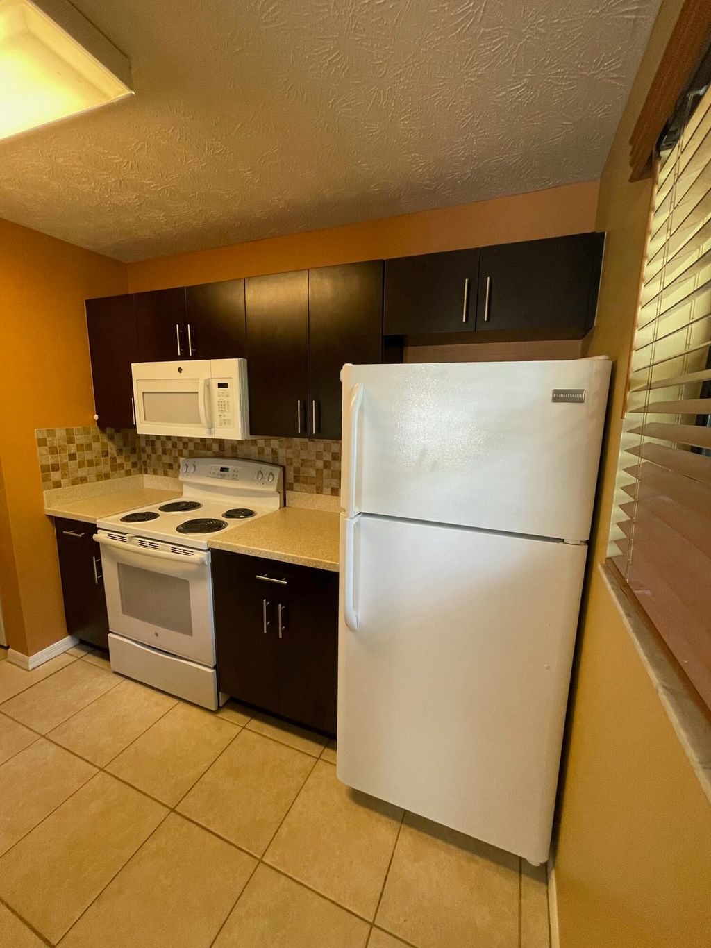 Photo of 6537 SE Federal Highway #103, Stuart, FL 34997 (MLS # R11042669)