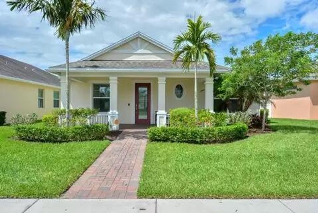 Photo of 10327 SW West Park Avenue, Port Saint Lucie, FL 34987 (MLS # R10786598)