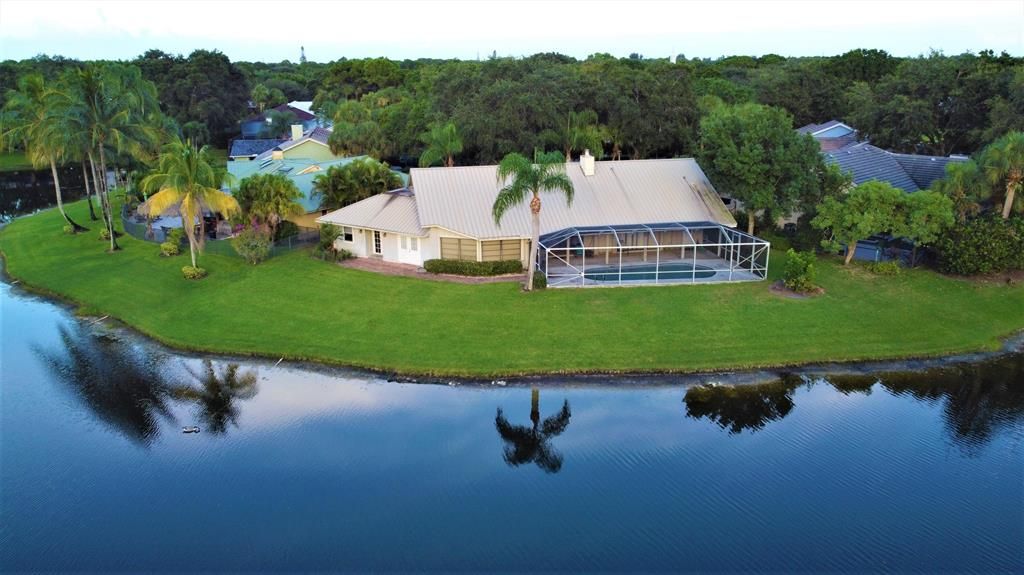 Photo of 6611 Woodloch Court Ct, Jupiter, FL 33458 (MLS # R10825661)